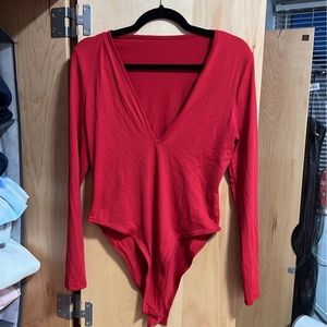 red silk body suit